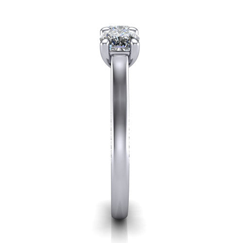 Maryam cushion three stone engagement ring in Platinum, side profile showing the pavé band with milgrain edges and the raised three-stone setting