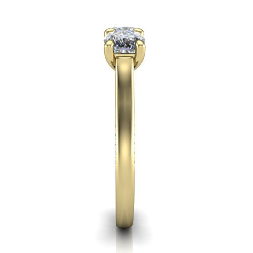 Maryam cushion three stone engagement ring in 18K Yellow Gold, side profile showing the pavé band with milgrain edges and the raised three-stone setting