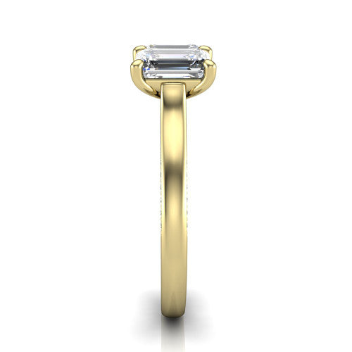 Maryam emerald three stone engagement ring in 14K Yellow Gold, side profile showing the pavé band with milgrain edges and the raised three-stone setting