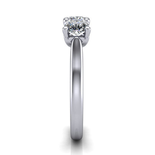 Amora cushion three stone engagement ring in 14K White Gold, side profile showing the plain polished band and the raised three-stone setting