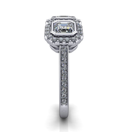 Aviana square emerald three stone halo engagement ring in 18K White Gold, side profile showing the pavé band, filigree scrollwork gallery, and three-stone halo in profile