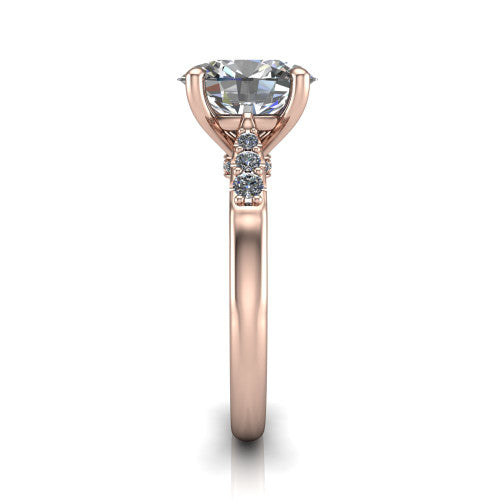 Jimena oval solitaire engagement ring in 18K Rose Gold, side profile showing the pavé shoulders, filigree under-gallery, and tapered band