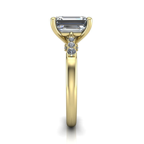 Jimena emerald solitaire engagement ring in 18K Yellow Gold, side profile showing the pavé shoulders, filigree under-gallery, and tapered band