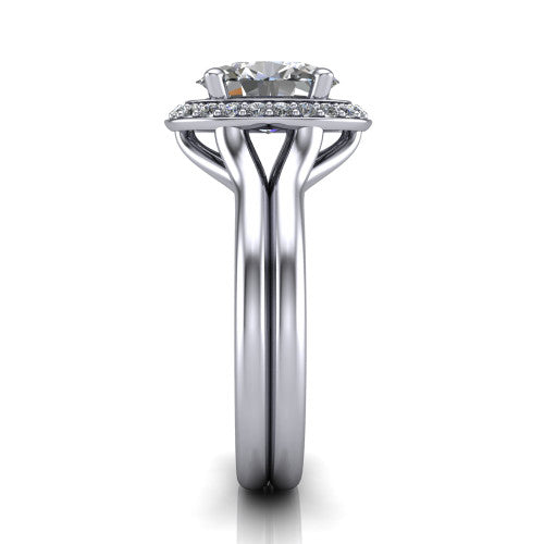 Selah oval halo engagement ring in Platinum, side profile showing the plain polished split shank rising to the halo and the open under-gallery