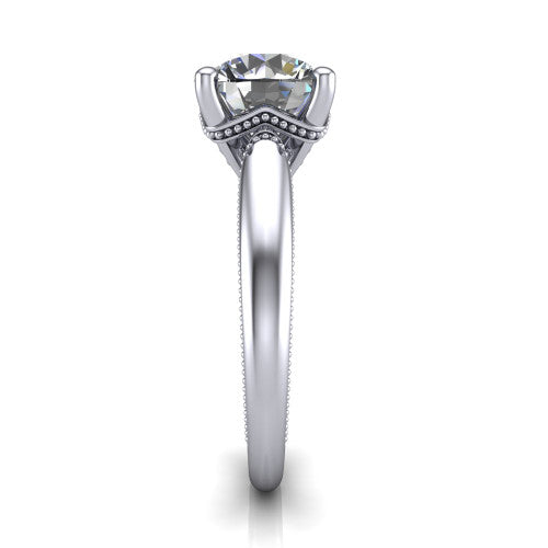 Laila round solitaire engagement ring in 14K White Gold, side profile showing the milgrain detailing running down the polished band in profile