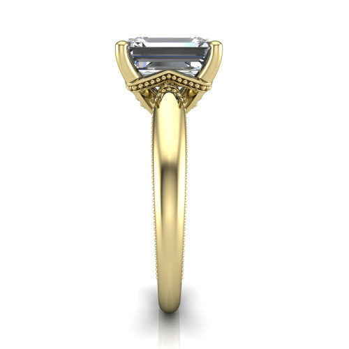 Laila emerald solitaire engagement ring in 14K Yellow Gold, side profile showing the milgrain detailing running down the polished band in profile