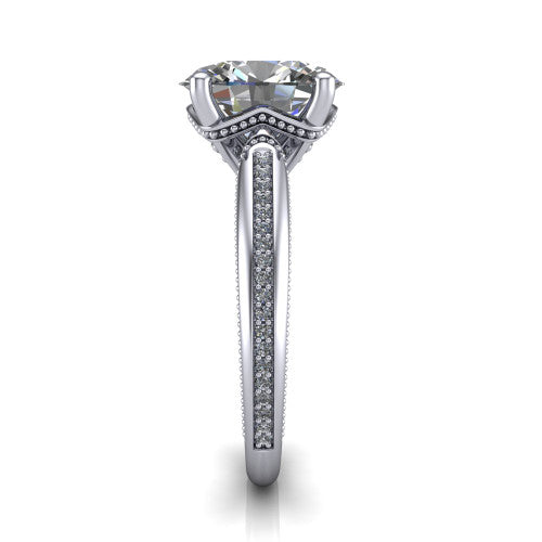 Vanessa oval solitaire engagement ring in Platinum, side profile showing the pavé running down the band and the milgrain detailing in profile