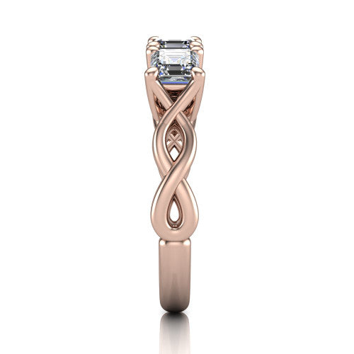 Aitana square emerald three stone engagement ring in 18K Rose Gold, side profile showing the plain polished band and the bar-set side stones in profile