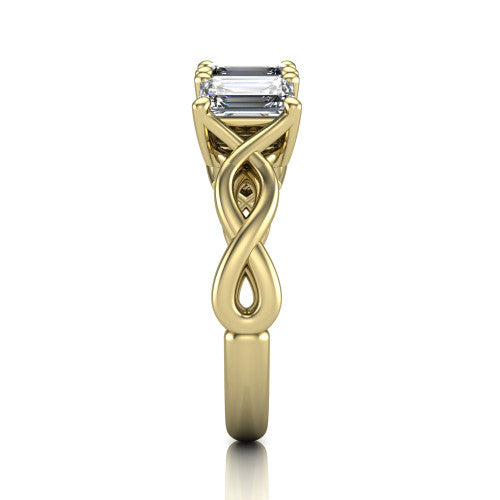 Aitana emerald three stone engagement ring in 14K Yellow Gold, side profile showing the plain polished band and the bar-set side stones in profile