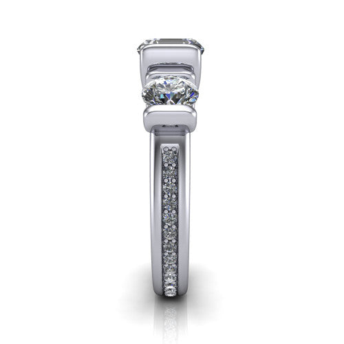 Fatima square emerald three stone engagement ring in 14K White Gold, side profile showing the pavé running down the band and the bar-set side stones in profile