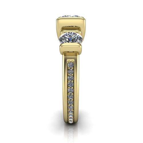 Fatima princess three stone engagement ring in 14K Yellow Gold, side profile showing the pavé running down the band and the bar-set side stones in profile