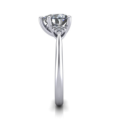 Raya heart three stone engagement ring in 18K White Gold, side profile showing the slim milgrain cathedral band and the side clusters in profile