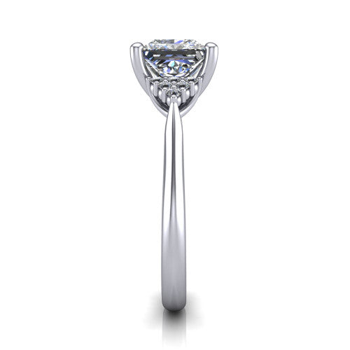 Raya princess three stone engagement ring in 18K White Gold, side profile showing the slim milgrain cathedral band and the side clusters in profile