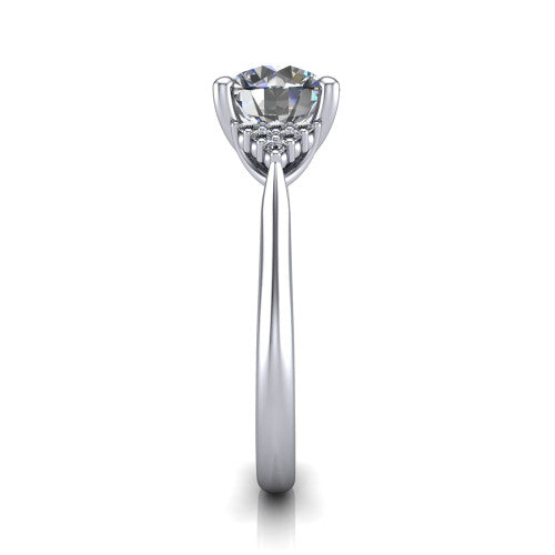 Raya round three stone engagement ring in 18K White Gold, side profile showing the slim milgrain cathedral band and the side clusters in profile
