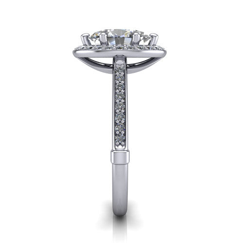 Alessandra oval halo engagement ring in 18K White Gold, side profile showing the pavé running down the band and the open cathedral gallery