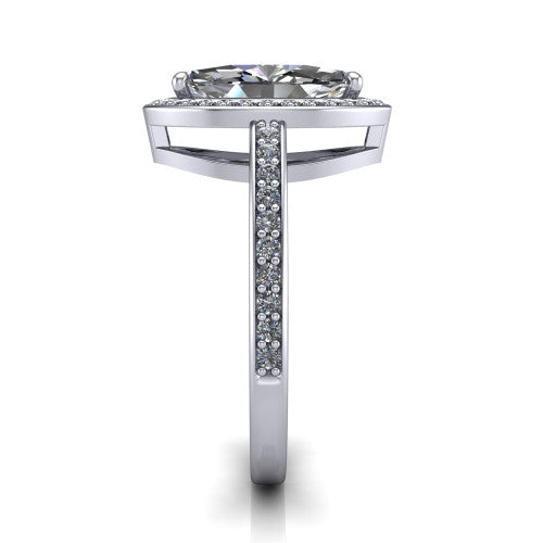 Skye marquise halo engagement ring in Platinum, side profile showing the pavé-lined under-basket and the diamonds running down the shank