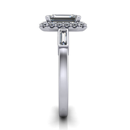 Lorelai emerald halo engagement ring in 18K White Gold, side profile showing the tapered baguette side stone and the smooth polished band