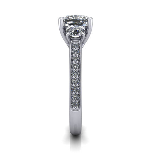 London cushion classic engagement ring in Platinum, side profile showing the round side stone and the pavé diamonds running down the shank