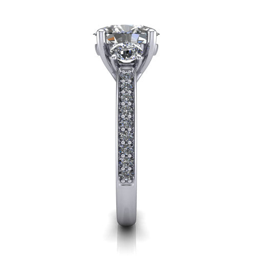 London oval classic engagement ring in 18K White Gold, side profile showing the round side stone and the pavé diamonds running down the shank