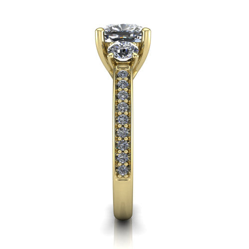 London cushion classic engagement ring in 14K Yellow Gold, side profile showing the round side stone and the pavé diamonds running down the shank