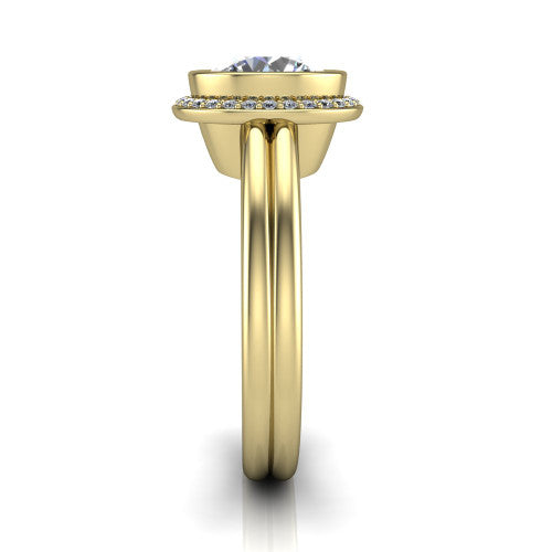 Maggie round halo engagement ring in 18K Yellow Gold, side profile showing the bezel-framed halo head and the two polished rails of the split shank
