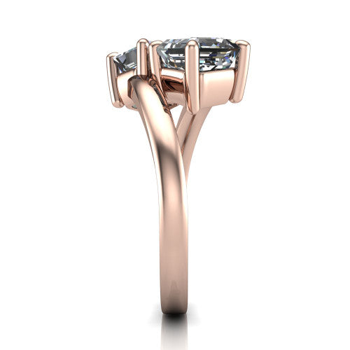 Adelaide asscher three stone engagement ring in 18K Rose Gold, side profile showing the slim single bypass band swirling beneath the two-stone head