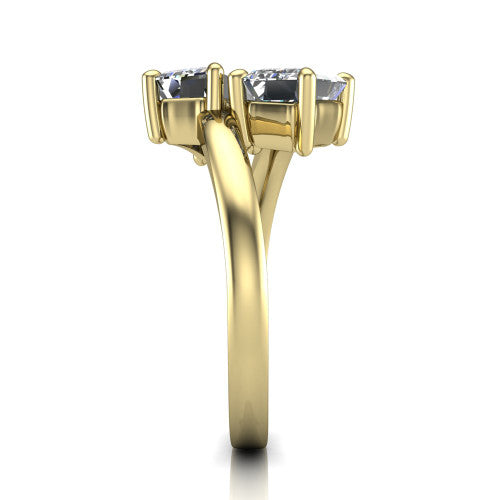 Adelaide emerald three stone engagement ring in 14K Yellow Gold, side profile showing the slim single bypass band swirling beneath the two-stone head