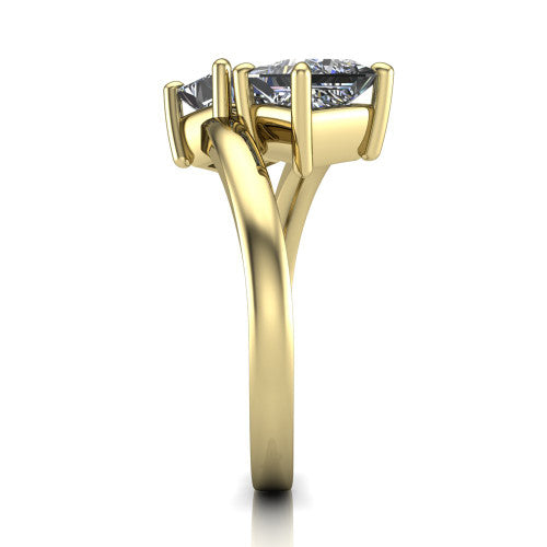 Adelaide princess three stone engagement ring in 14K Yellow Gold, side profile showing the slim single bypass band swirling beneath the two-stone head