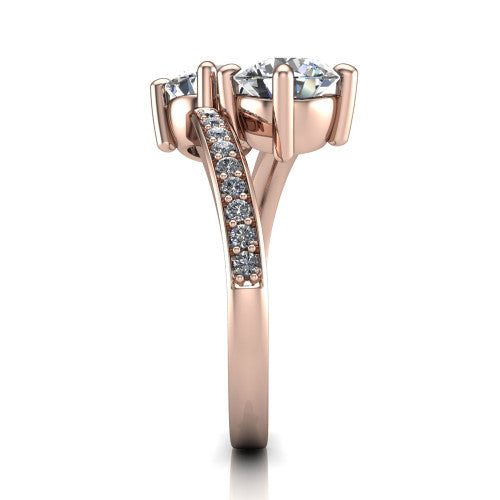 Payton round three stone engagement ring in 18K Rose Gold, side profile showing the pavé split shank crossing in a bypass beneath the two-stone head