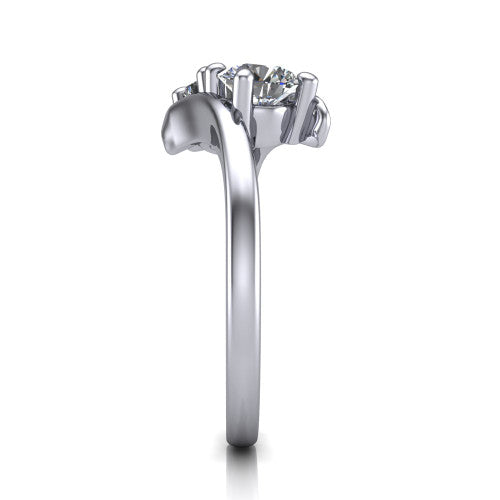 Alayna round three stone engagement ring in 14K White Gold, side profile showing the bypass swirl shoulders crossing beneath the two-stone head