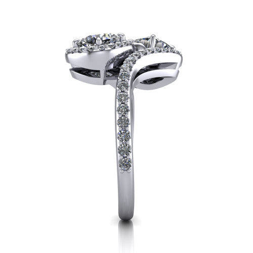 Jane cushion three stone engagement ring in Platinum, side profile showing the bypass swirling shoulders and pave diamonds wrapping the top and outer sides of the shank