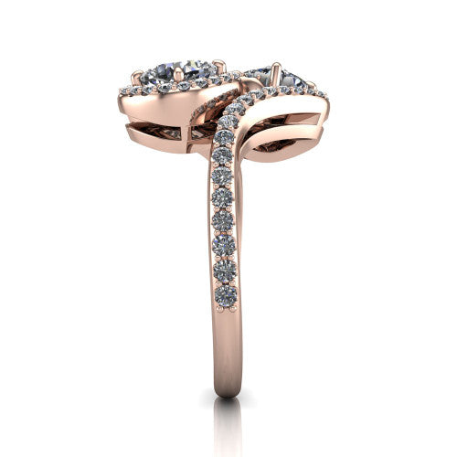Jane cushion three stone engagement ring in 18K Rose Gold, side profile showing the bypass swirling shoulders and pave diamonds wrapping the top and outer sides of the shank