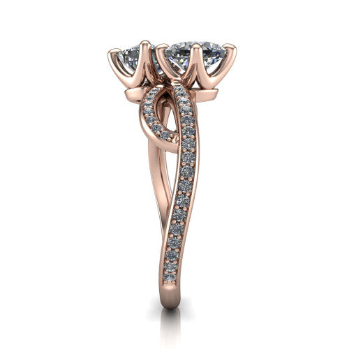 Angelina cushion three stone engagement ring in 18K Rose Gold, side profile showing the band crossing beneath the head as a pave-covered infinity loop