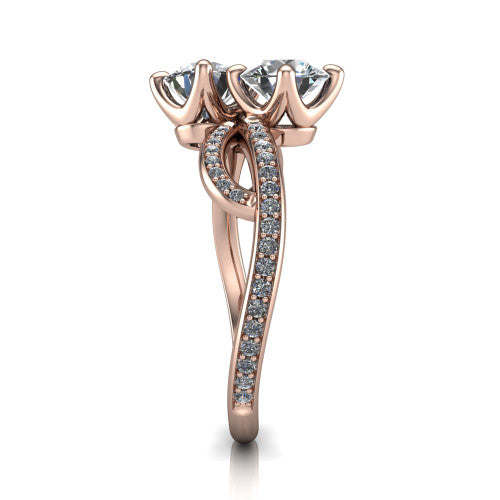 Angelina round three stone engagement ring in 18K Rose Gold, side profile showing the band crossing beneath the head as a pave-covered infinity loop