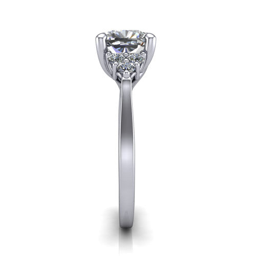 Raegan cushion three stone engagement ring in 18K White Gold, side profile showing the cluster head, tall basket, and slim polished band