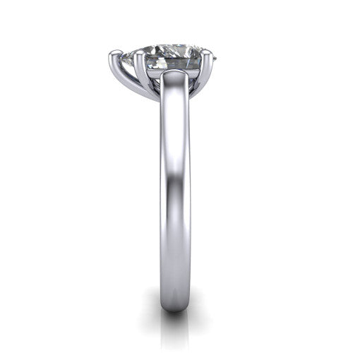 Madilyn pear solitaire engagement ring in Platinum, side profile showing the hidden pave accent under the basket and slim polished plain band
