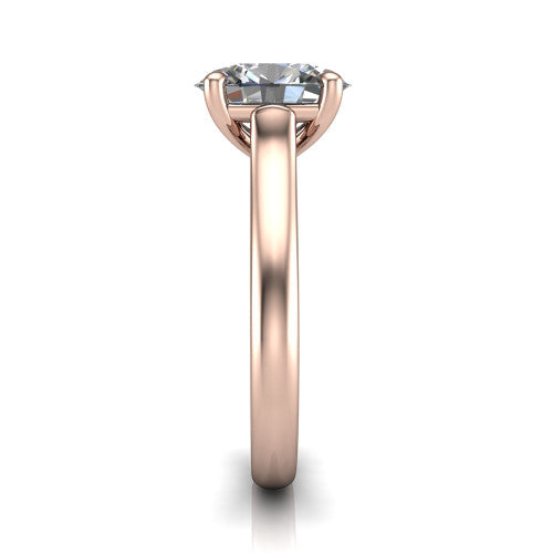 Madilyn oval solitaire engagement ring in 18K Rose Gold, side profile showing the hidden pave accent under the basket and slim polished plain band