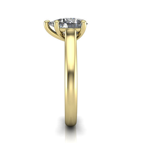 Madilyn pear solitaire engagement ring in 14K Yellow Gold, side profile showing the hidden pave accent under the basket and slim polished plain band