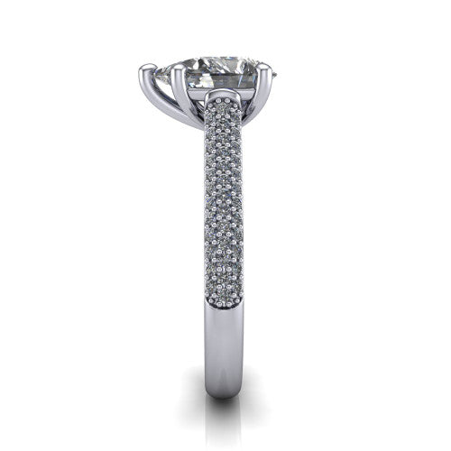 Izabella pear solitaire engagement ring in 14K White Gold, side profile showing the 3-sided micropave diamonds wrapping the top and outer sides of the shank
