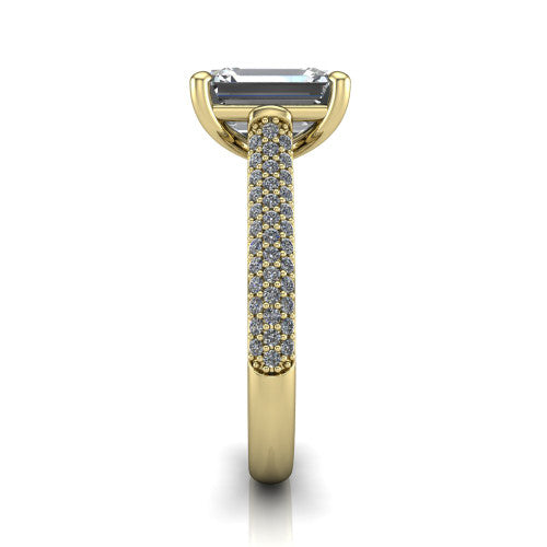 Izabella emerald solitaire engagement ring in 18K Yellow Gold, side profile showing the 3-sided micropave diamonds wrapping the top and outer sides of the shank