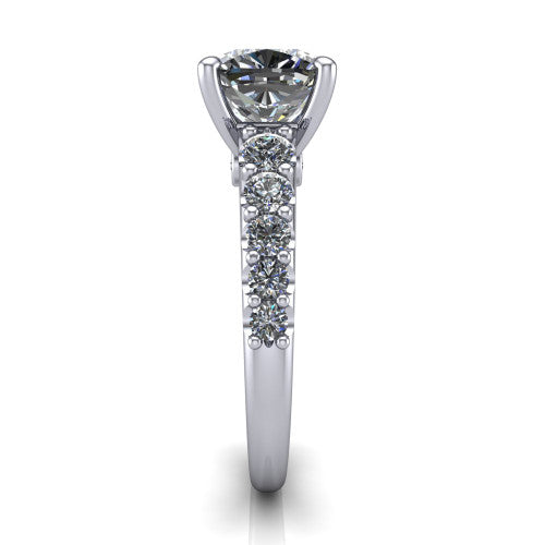 Nina cushion solitaire engagement ring in Platinum, side profile showing the hidden under-halo beneath the center stone and pave diamonds along the shoulders