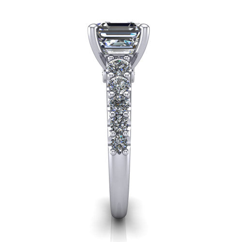Nina square emerald solitaire engagement ring in Platinum, side profile showing the hidden under-halo beneath the center stone and pave diamonds along the shoulders