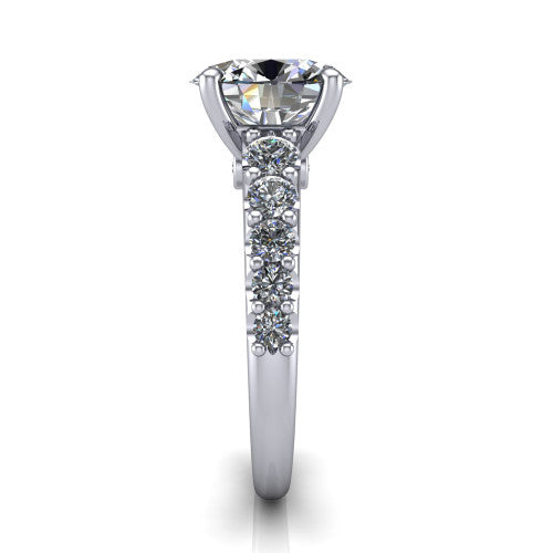 Nina oval solitaire engagement ring in 18K White Gold, side profile showing the hidden under-halo beneath the center stone and pave diamonds along the shoulders