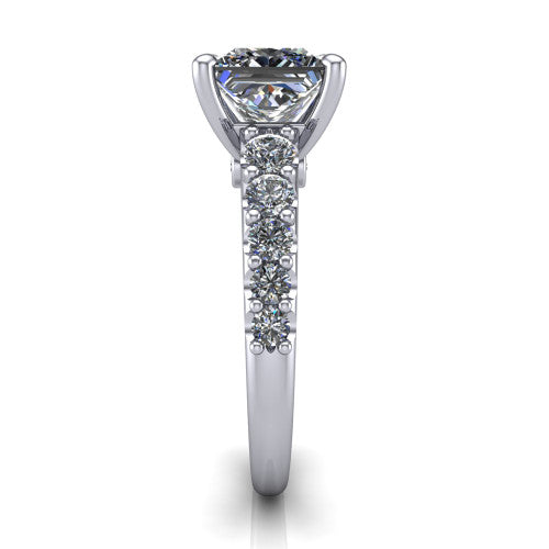 Nina princess solitaire engagement ring in 18K White Gold, side profile showing the hidden under-halo beneath the center stone and pave diamonds along the shoulders