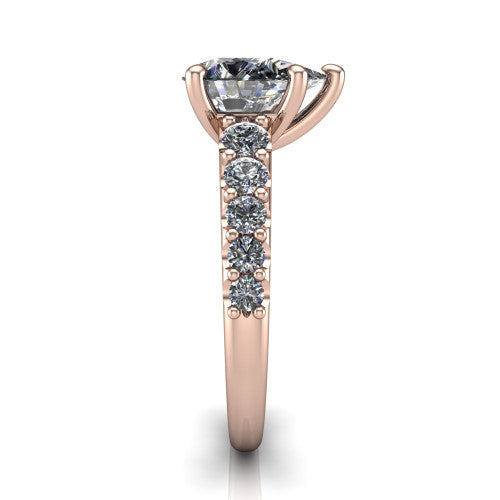 Nina pear solitaire engagement ring in 18K Rose Gold, side profile showing the hidden under-halo beneath the center stone and pave diamonds along the shoulders