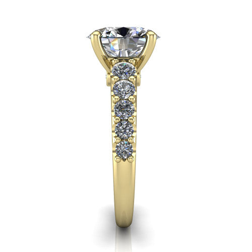 Nina oval solitaire engagement ring in 18K Yellow Gold, side profile showing the hidden under-halo beneath the center stone and pave diamonds along the shoulders