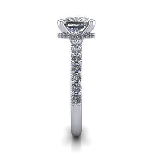 Nadia cushion hidden halo engagement ring in 18K White Gold, side profile showing the hidden pave halo under the center stone and pave diamonds running continuously around the shank