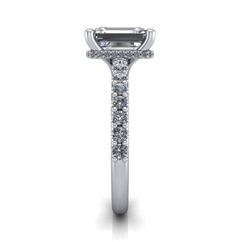 Nadia emerald hidden halo engagement ring in Platinum, side profile showing the hidden pave halo under the center stone and pave diamonds running continuously around the shank