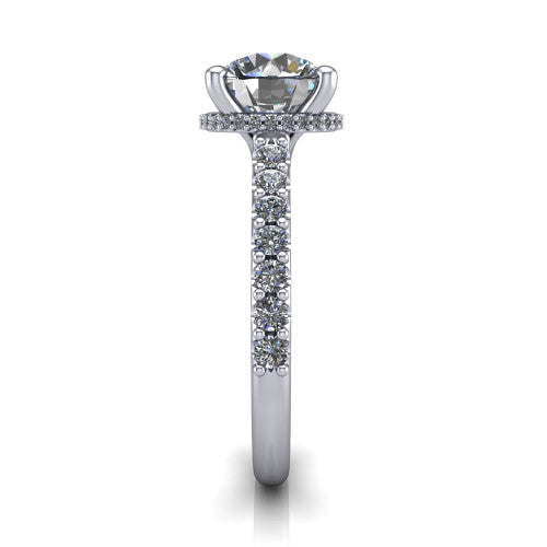 Nadia round hidden halo engagement ring in 18K White Gold, side profile showing the hidden pave halo under the center stone and pave diamonds running continuously around the shank