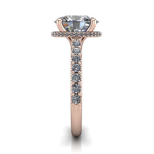 Nadia oval hidden halo engagement ring in 14K Rose Gold, side profile showing the hidden pave halo under the center stone and pave diamonds running continuously around the shank